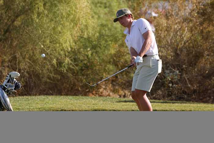 Gordon Sargent of the Vanderbilt Commodores chips on the green during the Division I Mens Golf Championship.